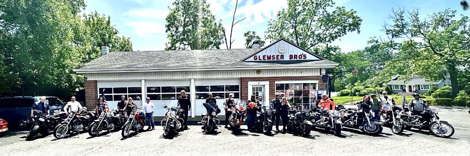 motorcycles out front of old shop