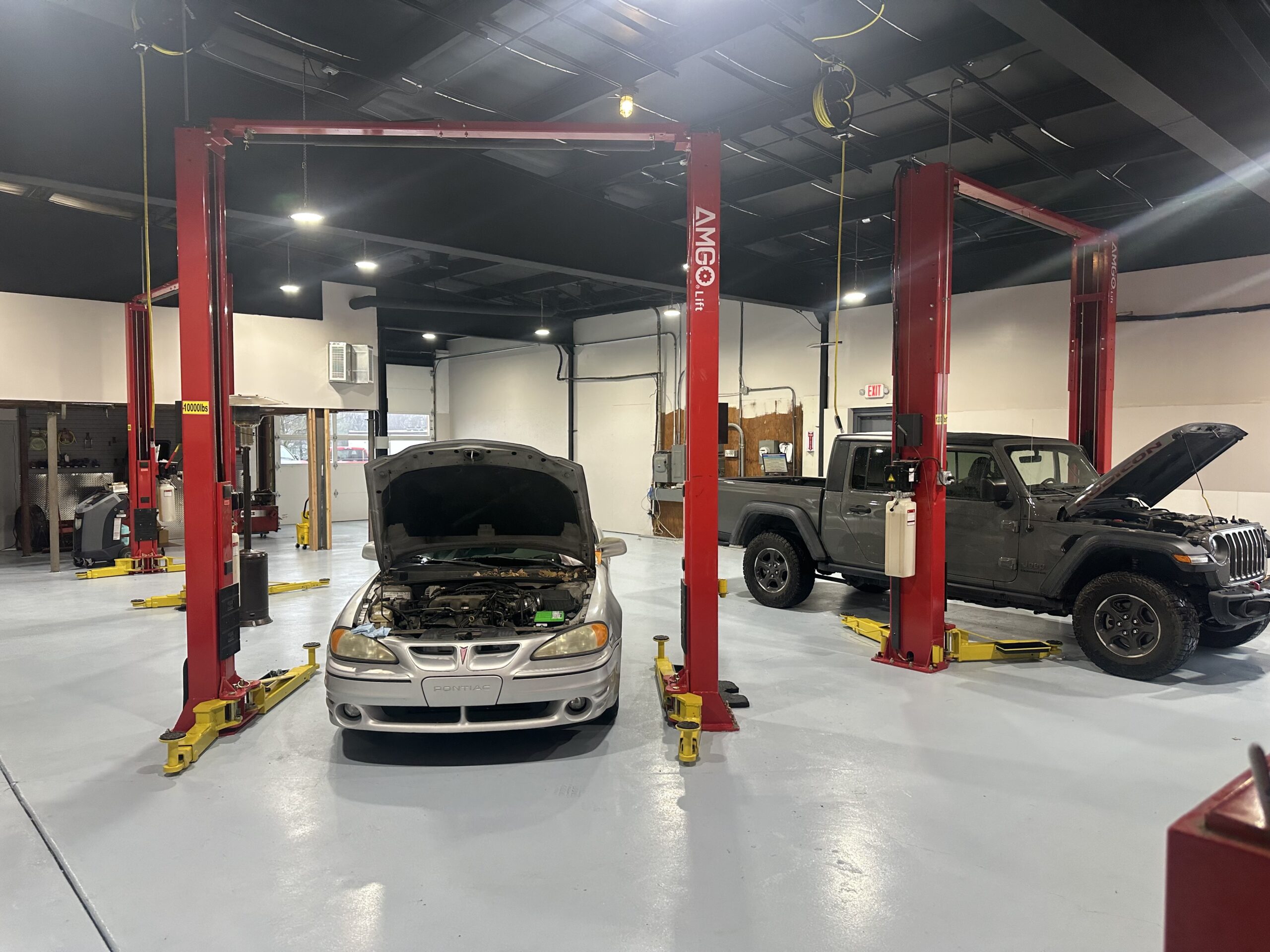 Three service bays inside the main shop